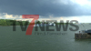 Dunkle Wolken über Wesseling - Regen prasselt auf den Rhein - Wetterexperten warnen vor starkem Unwetter - Feuerwehr und THW im Einsatz - erneute Überschwemmungen im Ahrtal: 