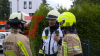 eine Person verletzt sich bei Rettungsversuch - Feuerwehr konnte Brandausbreitung verhindern - Brandausbruch in Küche: 