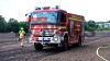 Flächenbrand breitet sich rasant aus – 1,5 Hektar Getreidefeld in Flammen - Feuer greift auf Baumfläche über - Wind entfacht schnell Großbrand, so Feuerwehr - NINA-Warnung wegen Rauch - Sichtbehinderungen durch Rauch - Luftbildaufnahmen zeigen Ausmaß des Brandes: 