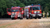 Flächenbrand breitet sich rasant aus – 1,5 Hektar Getreidefeld in Flammen - Feuer greift auf Baumfläche über - Wind entfacht schnell Großbrand, so Feuerwehr - NINA-Warnung wegen Rauch - Sichtbehinderungen durch Rauch - Luftbildaufnahmen zeigen Ausmaß des Brandes: 