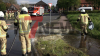 Güllefass kommt Abseits des Kreisverkehrs zum Liegen - Inhalt läuft in Wiese, auf Straße, in nahen Fluss und zum Gulli - Feuerwehr dichtet Gulli ab - Radlader stellt Güllefass wieder auf - Feuerwehr reinigt Straße mit Wasser - Unfallursache unklar: 